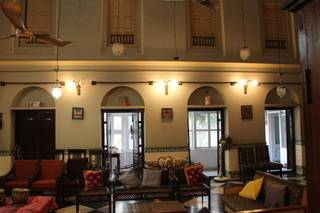 Homestay with 12 rooms and a banquet hall near River Ganga for sale.
