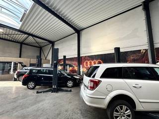 For Sale: Well-located car repair center in central Brussels with an operational setup.