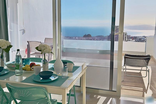Digitalized Lanzarote vacation rental company with licensed sea-view apartments and established OTA operations for sale.