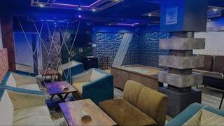 Premium multicuisine bar and restaurant offering dining, beverages, hookah, and party experiences in Berhampur.