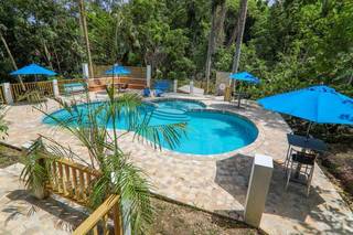 8 room retreat on 7.5 acre farm, top rated restaurant, pool, bar, 2,000 fruit trees.