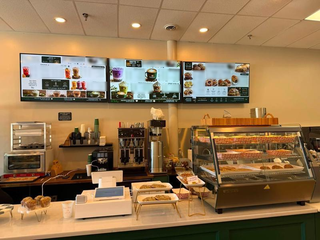 Modern café and shipping hub offering postal, logistics, printing, café services with multi-location growth potential.