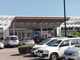 Insurance agency located in Portmore specializing in life and non-life policies, generating JMD 5 million/month.