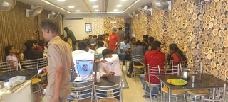 Fast food restaurant with a seating capacity of 50 located in commercial area in Chennai.
