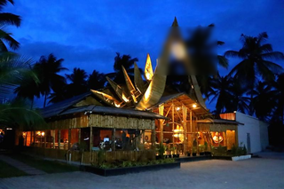 Bamboo-themed multi-cuisine restaurant near Mysore-Bangalore highway for sale, with high ratings and multiple revenue sources.