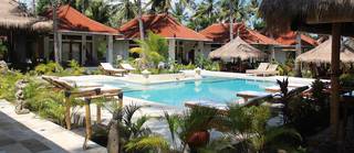 Eco resort nested in a coconut plantation, hidden paradise on Gili Meno, Indonesia for sale.