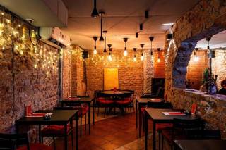 Vibrant bar in Belgrade's hub, offering unique nightlife experience with dedicated team and steady clientele.