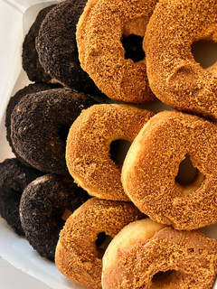 Home-based family bakery producing fresh cream-filled donuts for retail customers and occasional party orders.