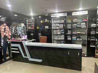 For Sale: Fully furnished men's clothing shop with wide range of apparel and accessories.