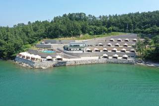 Private island South Korea resort land sale; buyer sought for luxury hospitality development value.