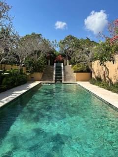 Luxurious Bali villa complex for sale in prime tourist location with 70% annual occupancy.