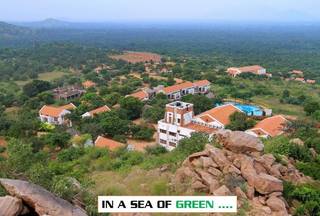 Hill-view resort in Madurai that has strong demand with 70% occupancy, offering unique cultural experience.