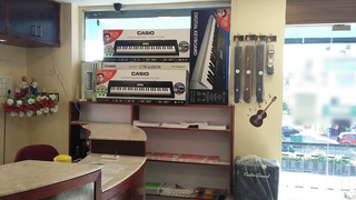 Musical instrumental retail store that imports and sells quality musical instruments, books and gift items.