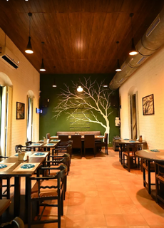 Lively Saligao steakhouse offering global cuisine, bar service, 150 seating, with strong dine-in revenue.