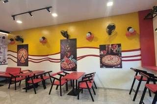 Franchise pizza café in a prime Pune location with loyal customer base and steady revenue.