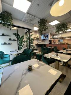 Dubai-based board game cafe restaurant specializing in international cuisine, seeking partial stake sale for growth.