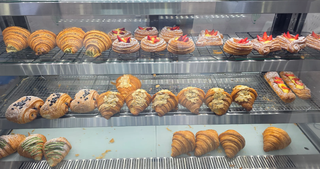 French bakery with six coffee shop clients, 50 daily walk-ins, seeking investment for new outlets.