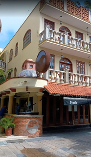 For Sale: Well-established hotel and restaurant with Caribbean Sea views accommodating up to 180 guests.