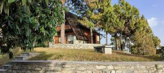 For Sale: Luxury resort w/full wooden construction in a reserve forest with panoramic Himalayan views.