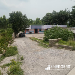 AP based packaged drinking water factory with 10k bottles/day capacity for sale with land.
