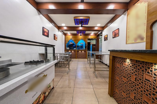 Selling a 50-seat vegetarian cafe with staff accommodation and growth potential in Koramangala.