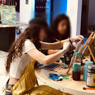 Multifunctional art studio selling art & party supplies, equipped with art classes & events centre.