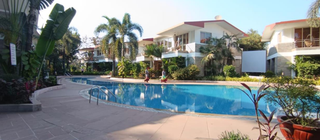 Scenic Silvassa resort for sale - 32 rooms, owned property with great expansion potential.