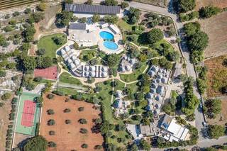 For sale: One-of-a-kind 5-star hotel featuring historic trulli in the heart of Puglia, Italy.