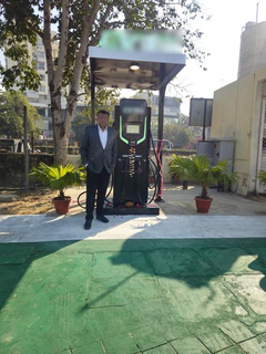 MCA-registered public EV charging network operating three stations and charging users per electricity unit consumed.