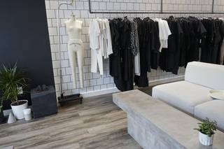 Established American women's clothing brand with loyal clientele, designer collections, design archive and relaunch potential.