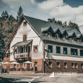 Restaurant with a seating capacity of 85 and 9 serviced apartments for sale.