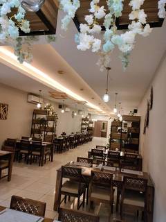 Well-established 72-seater pure vegetarian fine dining restaurant offering a multi-cuisine menu with high Google ratings.