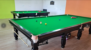 Hyderabad gaming zone near college offering snooker and consoles with steady footfall and revenue.