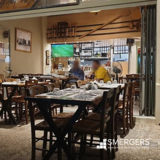 Greek and Cypriot Taverna in Heraklion, with 46 seating capacity, offering dine-in and home delivery.