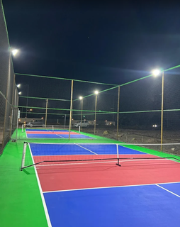 Operational Surat pickleball facility with two premium courts, regular bookings and Surat Municipal Corporation permission.
