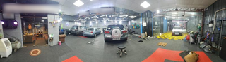 Automotive detailing business providing premium car care, paint, washing, and repair services from spacious facility.