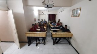 Pune based coaching centre offering classes for high school students seeks funding to build a school.