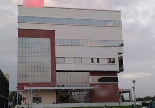 100-bed multispecialty hospital in Anand, Gujarat with 150 daily footfall and 40% IP occupancy.