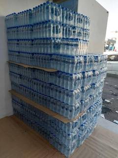 FMCG distribution startup seeking loan for material purchase and growth in water supply.