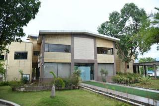 Luxury resort in Murbad with 92 rooms, premium amenities, event spaces, and strong investment potential.