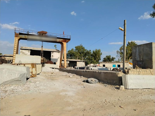 Sale of a granite factory building in Jalore of 1,189.62 sq m with ready-to-use infrastructure.