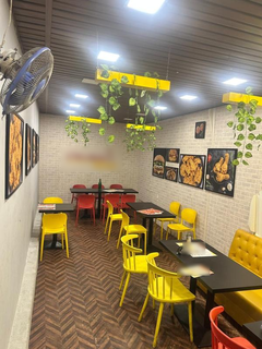 Fully operational fast-food restaurant serving fried chicken and quick-service meals with strong local customer demand.