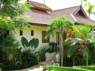 Boutique resort in Chiang Mai with 7 Lanna-style villas, 11 rooms, and extensive tropical gardens.
