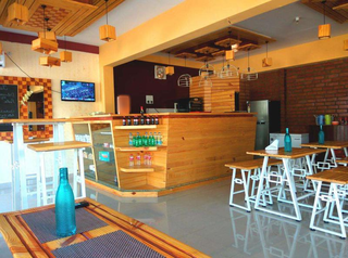 For Sale: Pizza cafe with its own brand located near a global university and college.
