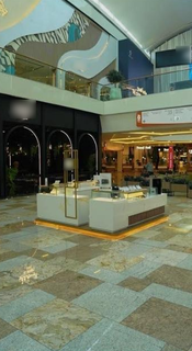 Newly established kiosk specializing in premium metal card engraving, personalization, and customized card transformation services.