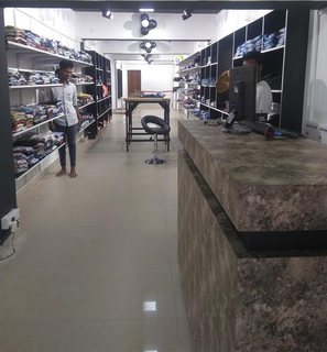 Company owning 2 retail shops for men's clothing and having tie ups with 20 distributors.
