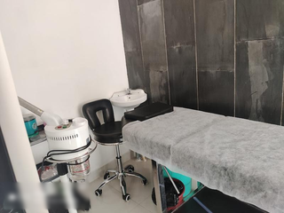 Fully equipped unisex salon and spa in a commercial location ready for sale.