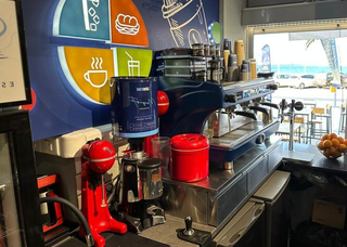 Explore a full sale opportunity for a popular cafe with 75 seats and slot machines.