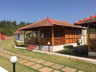 Goan farmhouse with 5 cottages and orchard with opportunity to capitalize on zoning and tourism.