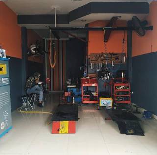 Seeking loan: Motorcycle restoration and general servicing business with 200+ clients served and own facility.